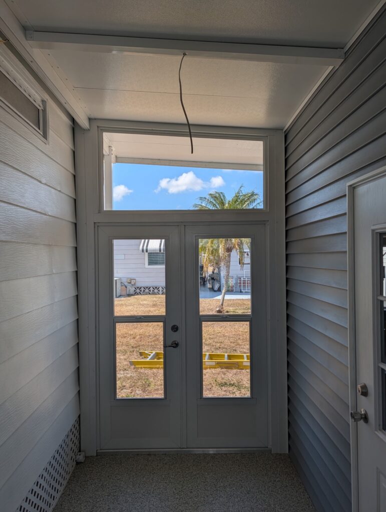 Double Guardian door with full single-hung glass on acrylic enclosure